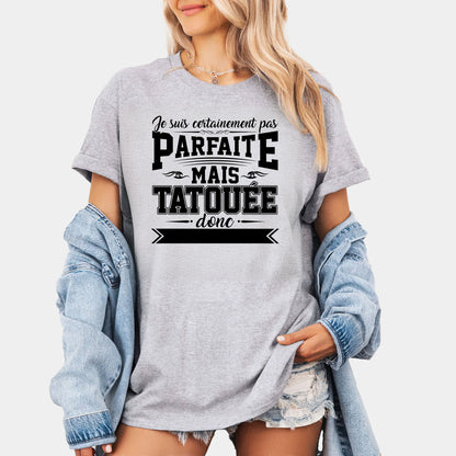 Je suis certainement pas parfaite mais tatouée donc c'est déjà pas mal