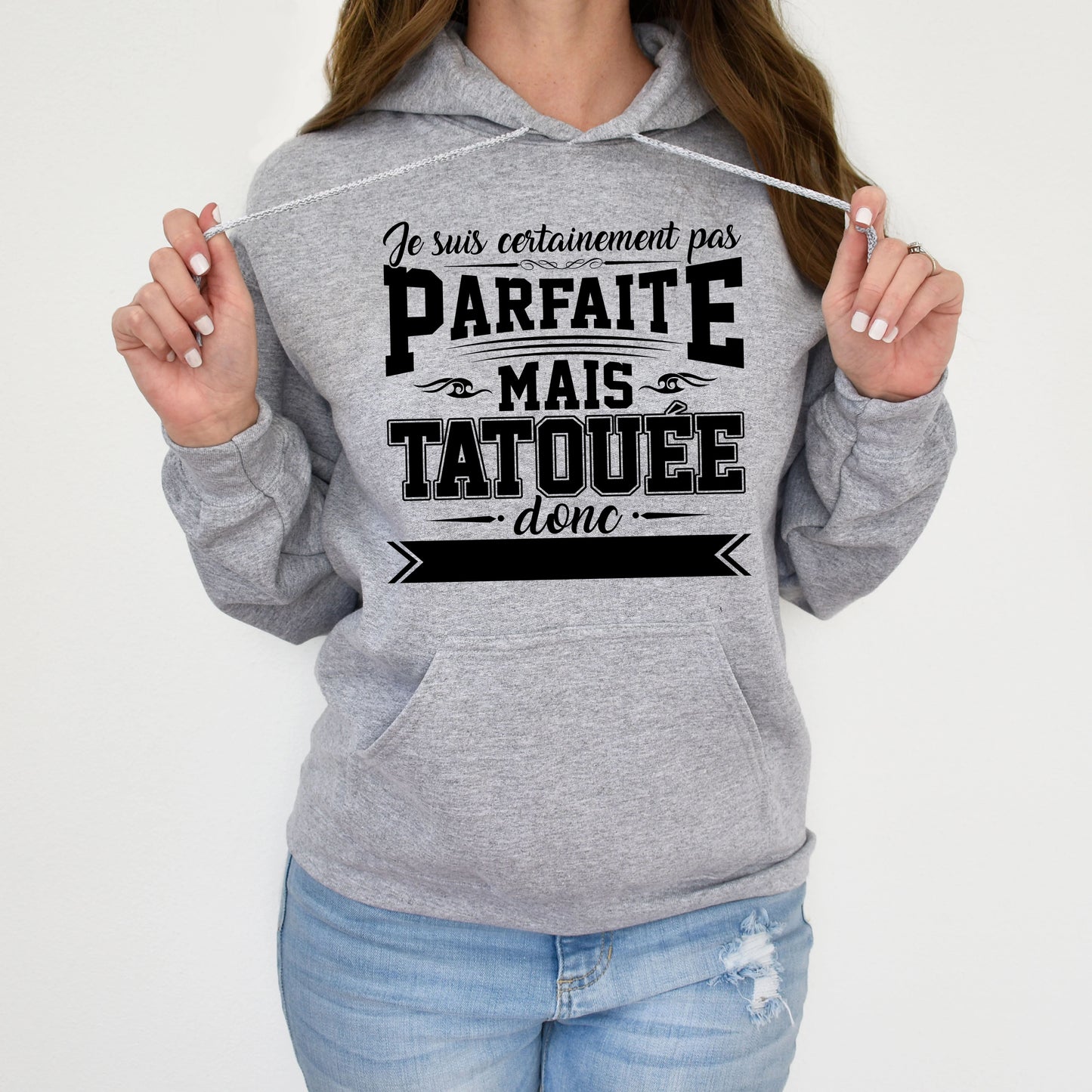 Je suis certainement pas parfaite mais tatouée donc c'est déjà pas mal