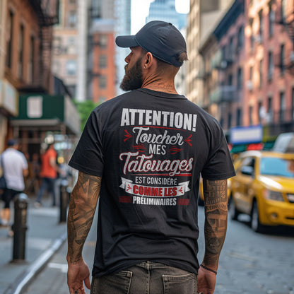Attention! Toucher mes tatouages est considéré comme les préliminaires