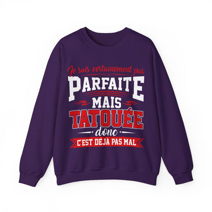 Je suis certainement pas parfaite mais tatouée donc c'est déjà pas mal