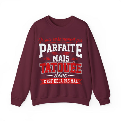 Je suis certainement pas parfaite mais tatouée donc c'est déjà pas mal