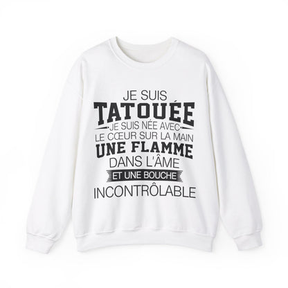 Je suis tatouée, je suis née avec le coeur sur la main une flamme dans l'âme et une bouche incontrôlable