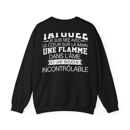 Je suis tatouée, je suis née avec le coeur sur la main une flamme dans l'âme et une bouche incontrôlable