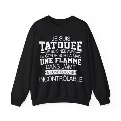 Je suis tatouée, je suis née avec le coeur sur la main une flamme dans l'âme et une bouche incontrôlable