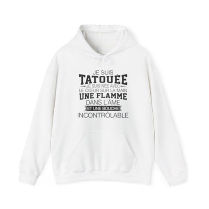 Je suis tatouée, je suis née avec le coeur sur la main une flamme dans l'âme et une bouche incontrôlable