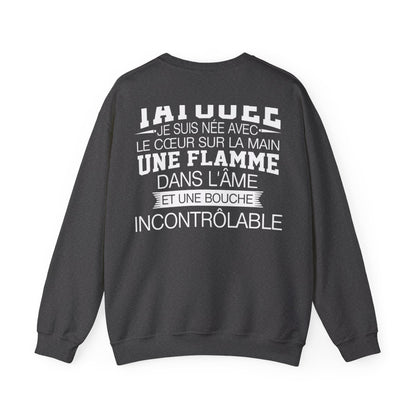 Je suis tatouée, je suis née avec le coeur sur la main une flamme dans l'âme et une bouche incontrôlable