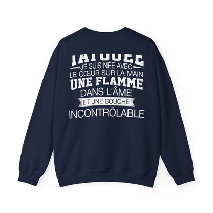 Je suis tatouée, je suis née avec le coeur sur la main une flamme dans l'âme et une bouche incontrôlable