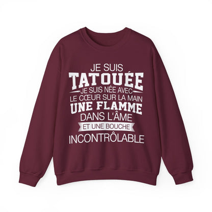 Je suis tatouée, je suis née avec le coeur sur la main une flamme dans l'âme et une bouche incontrôlable
