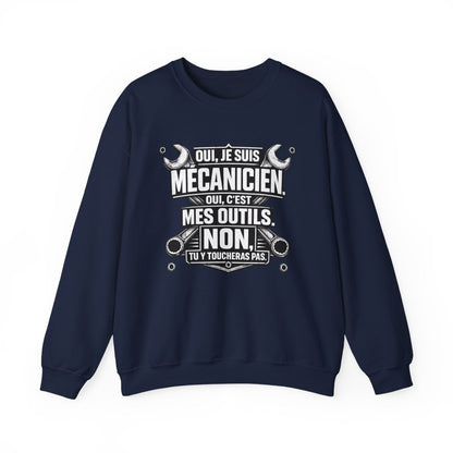 Oui, je suis Mécanicien. Oui, c'est mes outils.