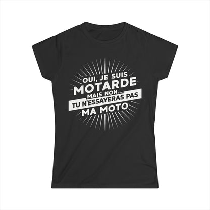 Oui, je suis motarde mais non... tu n'essayeras pas ma moto