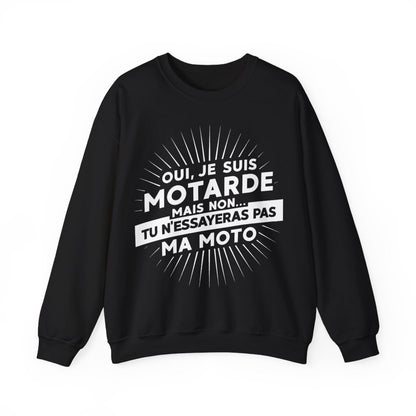 Oui, je suis motarde mais non... tu n'essayeras pas ma moto