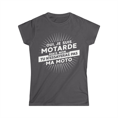Oui, je suis motarde mais non... tu n'essayeras pas ma moto