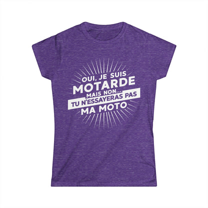Oui, je suis motarde mais non... tu n'essayeras pas ma moto