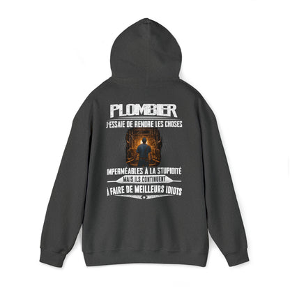 Plombier, j'essaie de rendre les choses imperméables à la stupidité