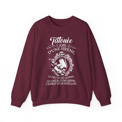 Tatouée l'âme d'une sirène, le feu d'une lionne, le coeur d'une hippie, l'esprit d'un papillon